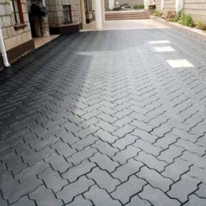 Grey and black 60mm Zigzag cabros in Kenya arranged on a concrete surface